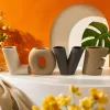 A colorful striped letter vase set in the shape of "LOVE" for home decoration Specification image